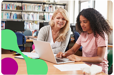 Teacher and Pupil Looking Laptop Screen to visualise customised dashboards