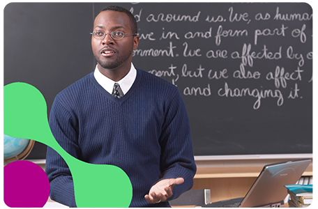 Image of school leader giving lesson to pupils