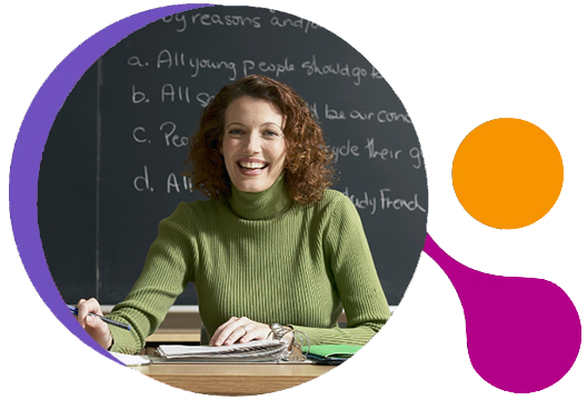 Image of School Leader in front of blackboard